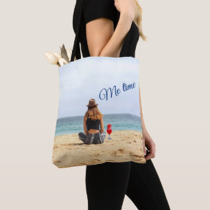 Woman On The Beach With Drink Me Time Tote Bag