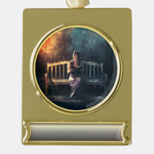 Woman Reading Book in the Rain Gold Plated Banner Ornament