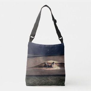 Woman Reading Inside Book at Night Crossbody Bag