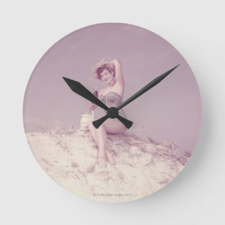 Woman Relaxing on Beach Round Clock