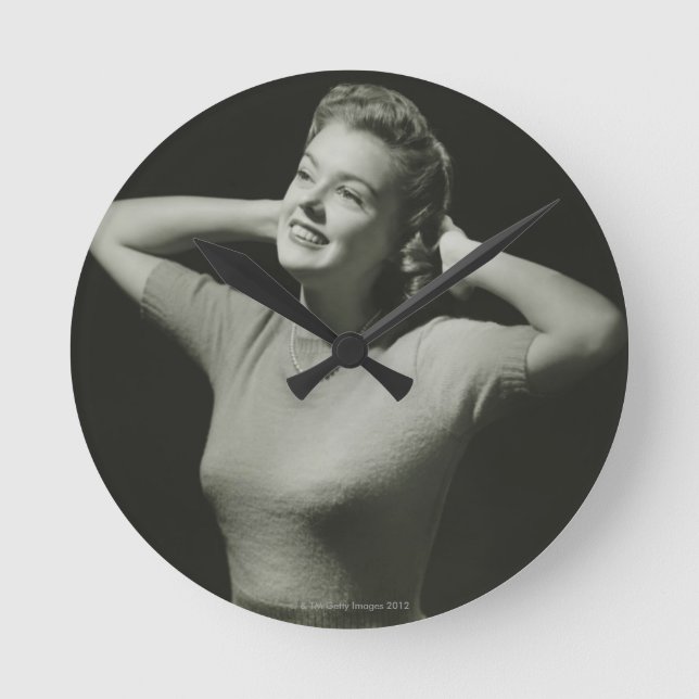 Woman Relaxing Round Clock (Front)