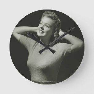 Woman Relaxing Round Clock