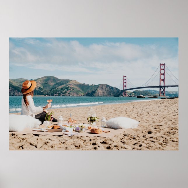 Woman sitting near seashore while looking at Golde Poster (Front)