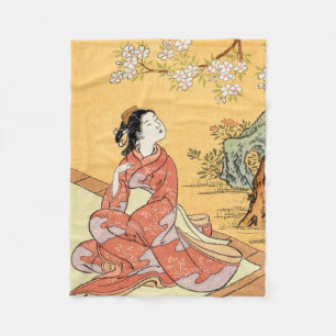Woman Sitting Under Cherry Blossoms Fleece Blanket