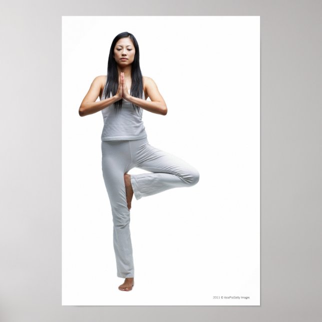 Woman standing in yoga position poster (Front)