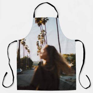 Woman standing near outdoor in the morning apron