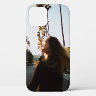 Woman standing near outdoor in the morning iPhone 12 case