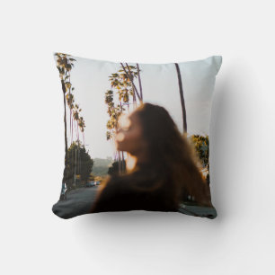 Woman standing near outdoor in the morning cushion