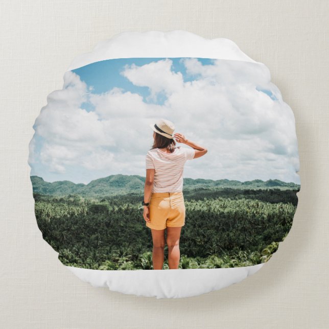 Woman standing near trees round cushion (Front)