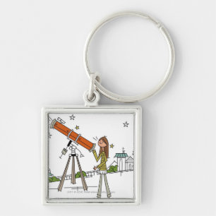 Woman using an astronomy telescope key ring