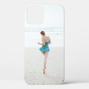 Woman walking on shore near beach iPhone 12 case