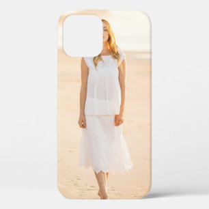 Woman walking on the shore iPhone 12 case