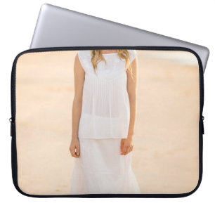 Woman walking on the shore laptop sleeve