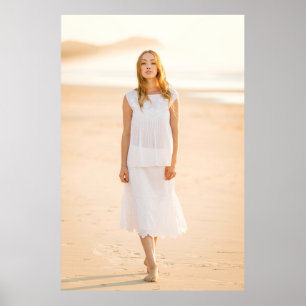 Woman walking on the shore poster