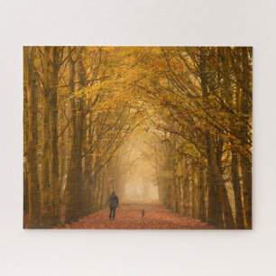 Woman walking with her dog on fall morning jigsaw puzzle