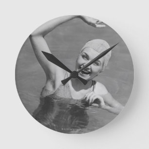 Woman Waving Round Clock
