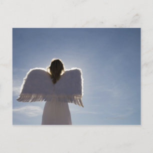 Woman wearing angel wings, rear view, three postcard