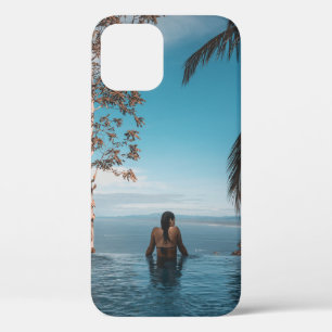 Woman wearing black bikini tap swimming on body of iPhone 12 case