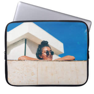 Woman wearing black sunglasses laptop sleeve
