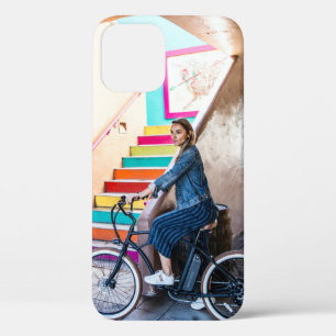 Woman wearing blue denim jacket and shorts riding  iPhone 12 case