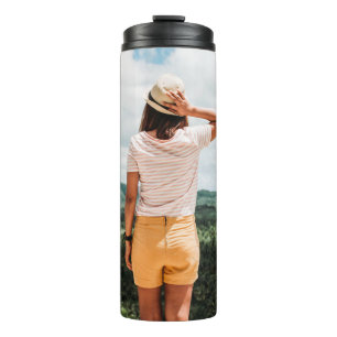 Woman wearing yellow shorts thermal tumbler