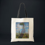Woman with a Parasol, Monet Tote Bag<br><div class="desc">Oscar-Claude Monet (14 November 1840 – 5 December 1926) was a French painter, a founder of French Impressionist painting and the most consistent and prolific practitioner of the movement's philosophy of expressing one's perceptions before nature, especially as applied to plein air landscape painting. The term ""Impressionism"" is derived from the...</div>
