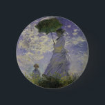 Woman with Parasol by Claude Monet, Vintage Art 6 Cm Round Badge<br><div class="desc">The Stroll, Camille Monet and Her Son Jean (Woman with a Parasol) (1875) by Claude Monet is a vintage impressionist fine art family portrait painting. A mother taking a walk with her young child in a field or spring meadow. She is holding a sun umbrella and wearing a beautiful dress...</div>