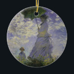 Woman with Parasol by Claude Monet, Vintage Art Ceramic Ornament<br><div class="desc">The Stroll, Camille Monet and Her Son Jean (Woman with a Parasol) (1875) by Claude Monet is a vintage impressionist fine art family portrait painting. A mother taking a walk with her young child in a field or spring meadow. She is holding a sun umbrella and wearing a beautiful dress...</div>