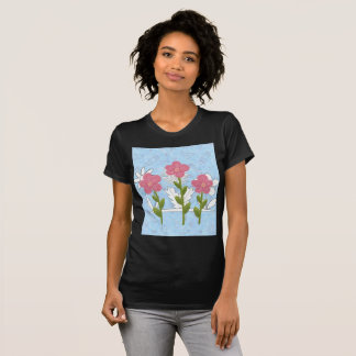 womans drawing colouring flowers shirt