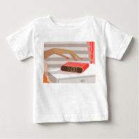 Womans hand pushing on alarm clock snooze button