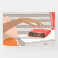 Womans hand pushing on alarm clock snooze button