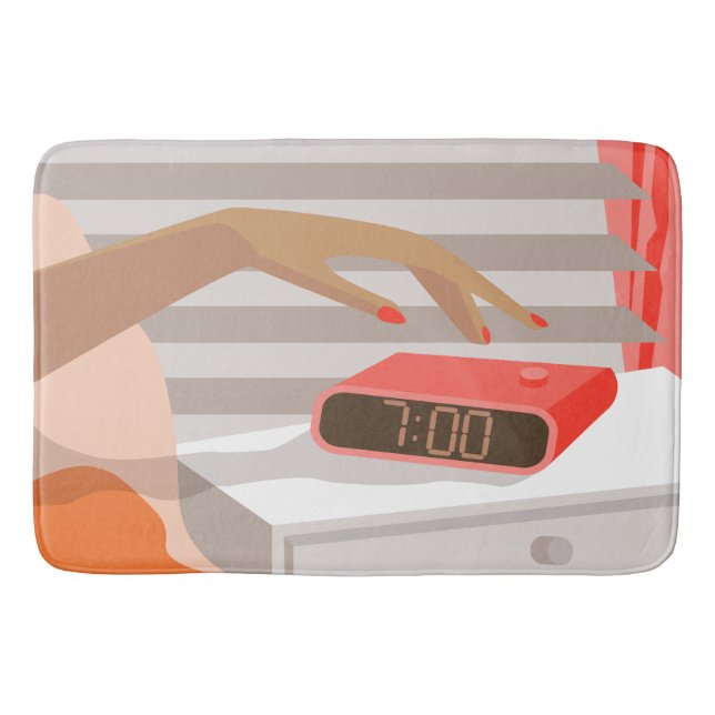 Womans hand pushing on alarm clock snooze button bath mat (Front)