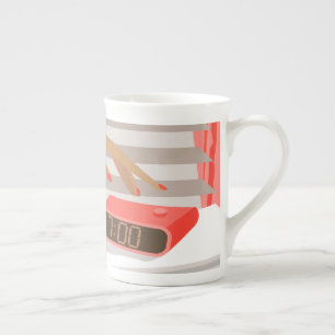 Womans hand pushing on alarm clock snooze button bone china mug