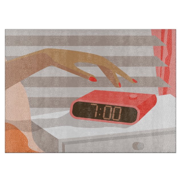 Womans hand pushing on alarm clock snooze button cutting board (Front)