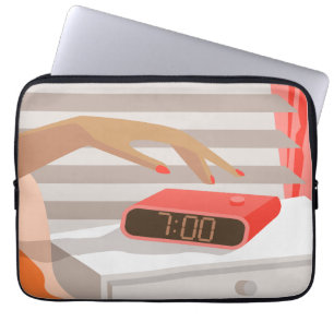 Womans hand pushing on alarm clock snooze button laptop sleeve