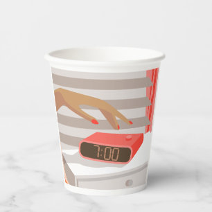 Womans hand pushing on alarm clock snooze button paper cups