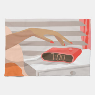 Womans hand pushing on alarm clock snooze button tea towel