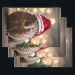 "Wombat Wonderland: A Cozy Christmas Eve" Wrapping Paper Sheet<br><div class="desc">This image shows the festive warmth of a wombat in a Santa hat,  set beside a Christmas tree and gifts with a magical bokeh background.</div>