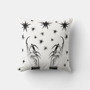 Women witch background with stars, witch hands wit cushion