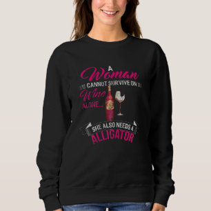Womens A Woman Cannot Survive Wine Alone She Also Sweatshirt