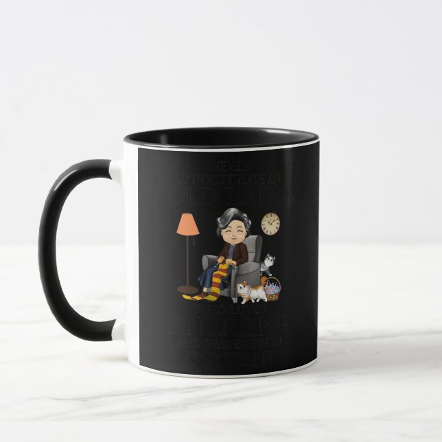 Womens old lady loves knitting born in october mug (Left)