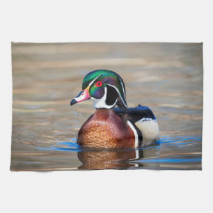 Wood Duck in a pond Tea Towel