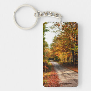 Wood trail with fall foliage key ring