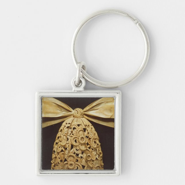 Woodcarving of a cravat key ring (Front)