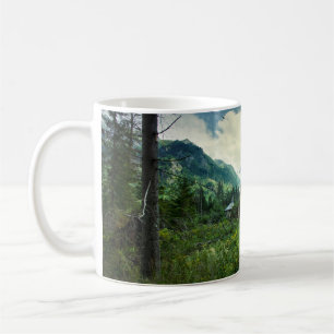 Wooden house, mountain nature scenery. coffee mug