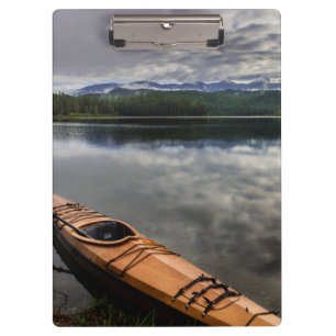 Wooden kayak on shore of Beaver Lake Clipboard