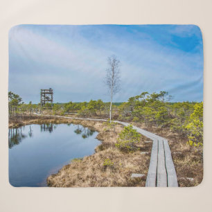 Wooden trail over swamp with tower sherpa blanket