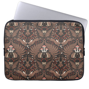 Woodland animals and plants in red and brown laptop sleeve