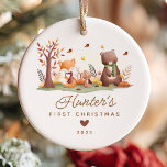Woodland Photo Baby's First Christmas Ceramic Ornament<br><div class="desc">This cute baby's first Christmas ornament features woodland animals, including a fox, bunny rabbit, owl, and bear. The ornament can be easily personalised with the baby's name, date, and photo. The design is simple and whimsical, with the woodland animals arranged around a tree log. The ornament is perfect for celebrating...</div>