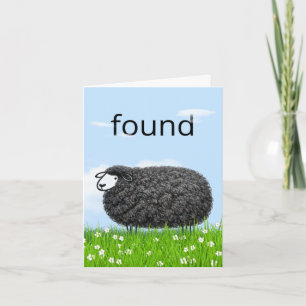Wooly Black Sheep In Grass with "Found" Text Card